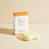Skinnerver salicylic acid soap bar and packaging on a textured surface